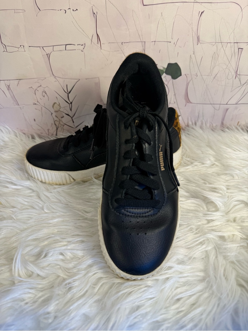 Puma Women’s Black Sneakers with White Sole and Gold Accent